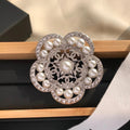 Chanel Camellia Pearls 18K Gold Brooch product image 1, provided for visual reference and product detail review