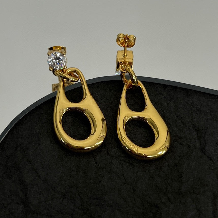 Prada Inverted Triangle 18K Gold Earrings product image 1, provided for visual reference and product detail review