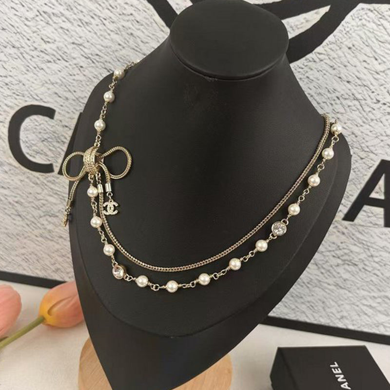 Chanel Bow Tie Pearl 18K Gold Necklace product image 3, provided for visual reference and product detail review