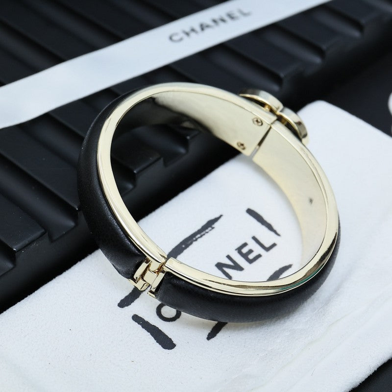 Chanel Black Leather Cuff 18K Gold Bracelet product image 6, provided for visual reference and product detail review
