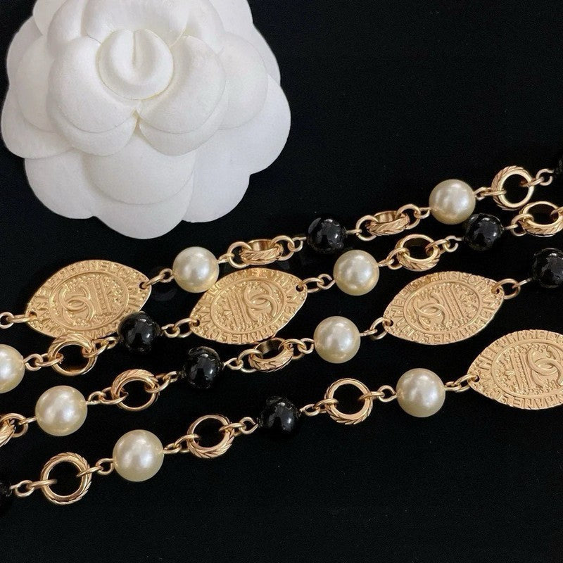 Chanel Long Black & White Pearls 18K Gold Necklace product image 6, provided for visual reference and product detail review