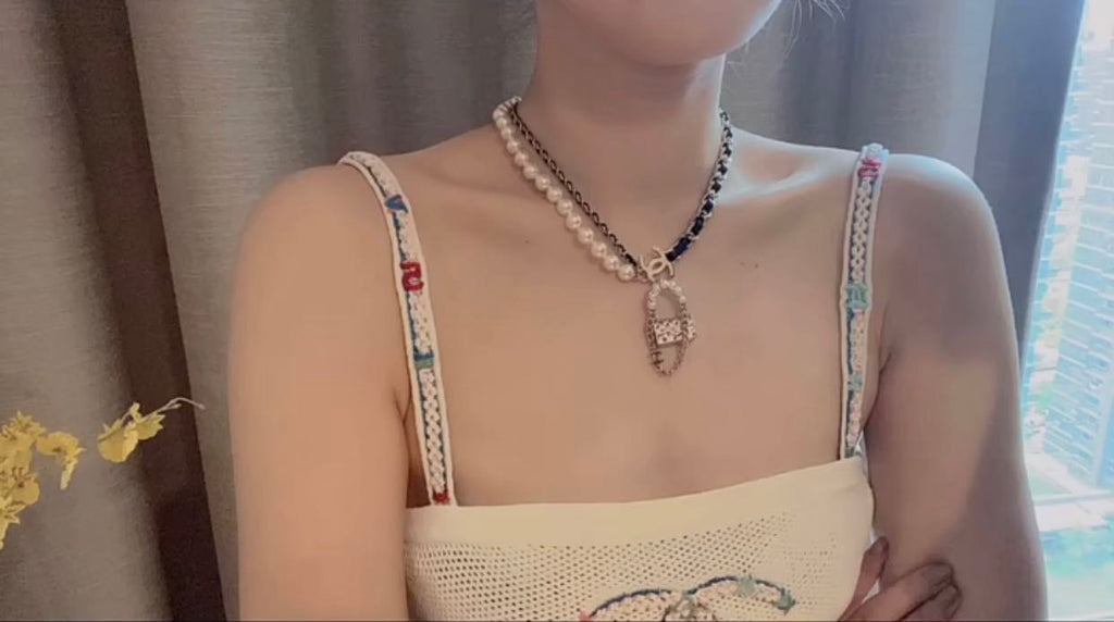 Chanel Pearl Leather Bag Pendant 18K Gold Necklace product image 6, provided for visual reference and product detail review