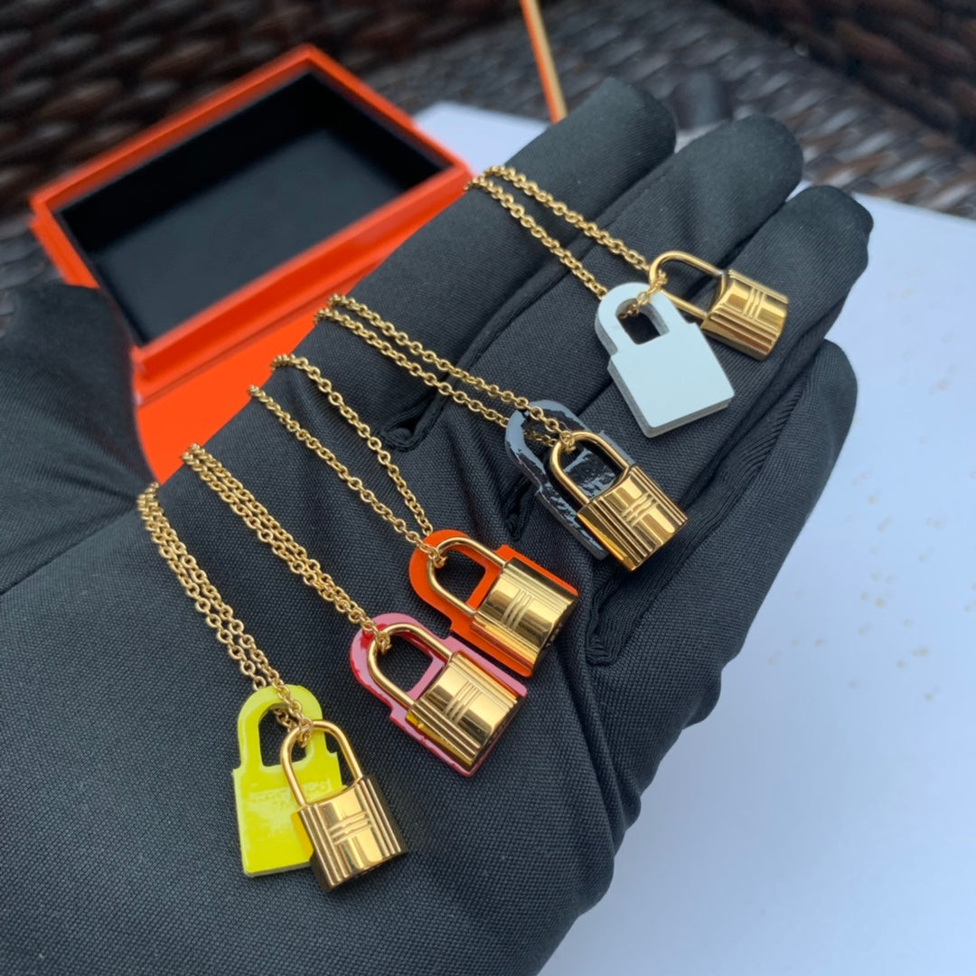 Hermes O'Kelly Orange Pendant 18K Gold Necklace product image 7, provided for visual reference and product detail review