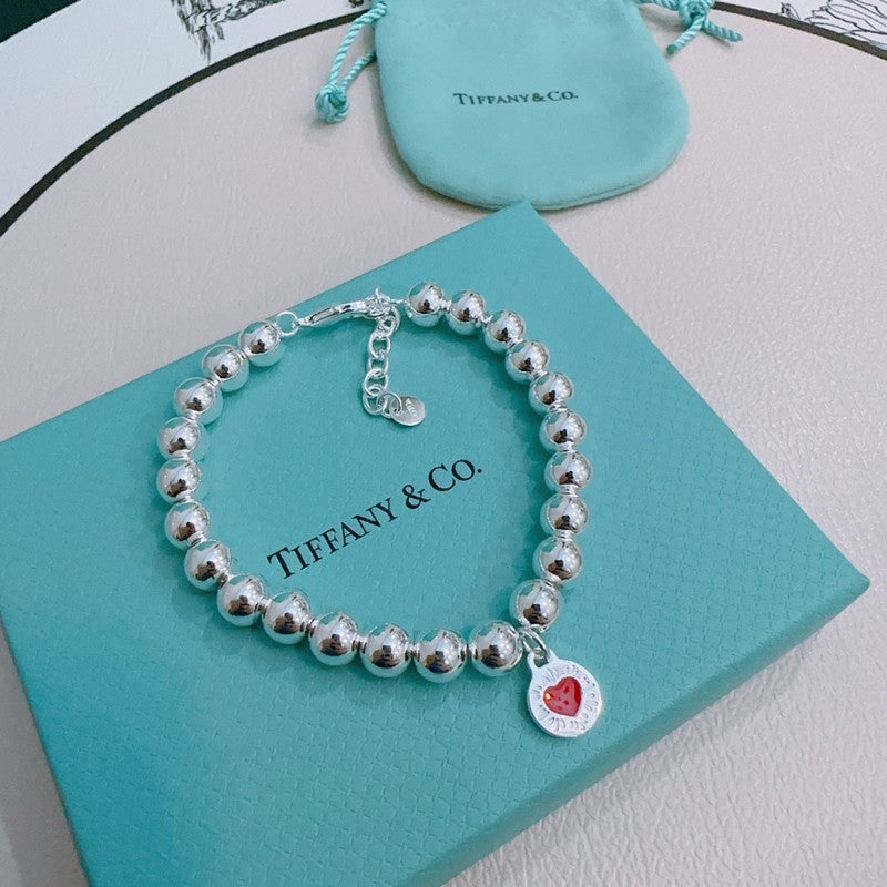 Tiffany Return to Red Heart Bead 18K Gold Bracelet product image 6, provided for visual reference and product detail review