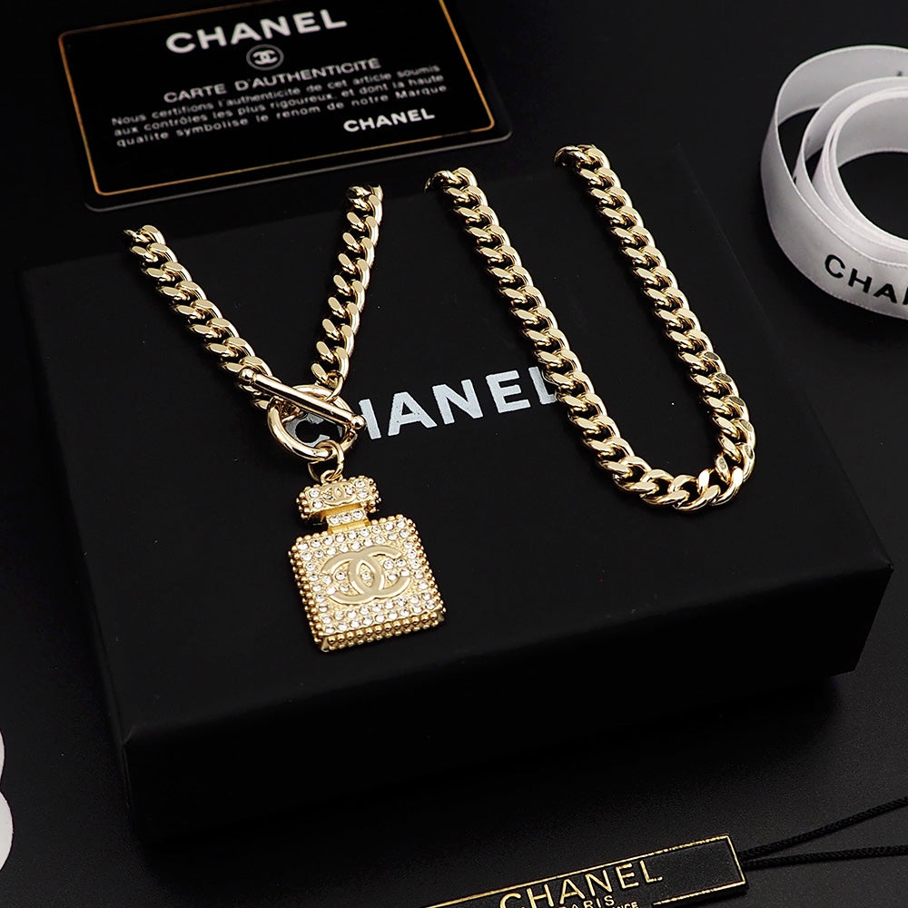 Chanel Diamond Perfume Bottle Pendant 18K Gold Necklace product image 8, provided for visual reference and product detail