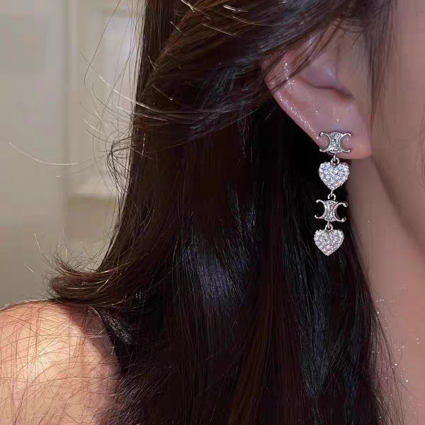 Celine Heart Pendant 18K Gold Earrings product image 2, provided for visual reference and product detail review