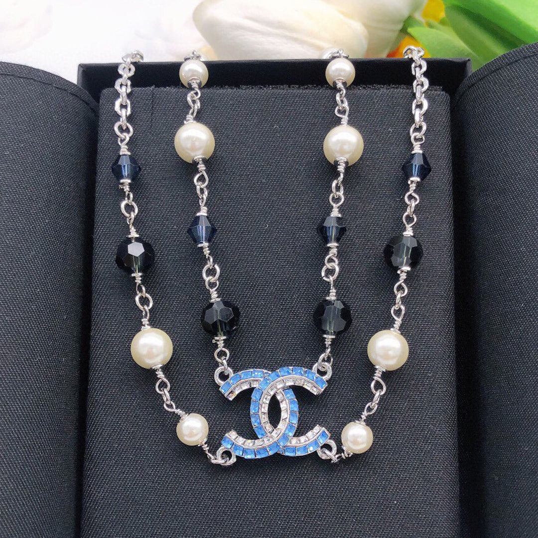Chanel Blue Resin 18K Gold Necklace product image 1, provided for visual reference and product detail review