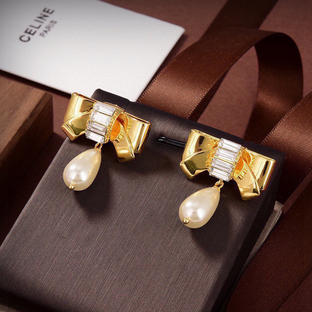 Celine Butterfly Pearl Pendant 18K Gold Earrings product image 1, provided for visual reference and product detail review