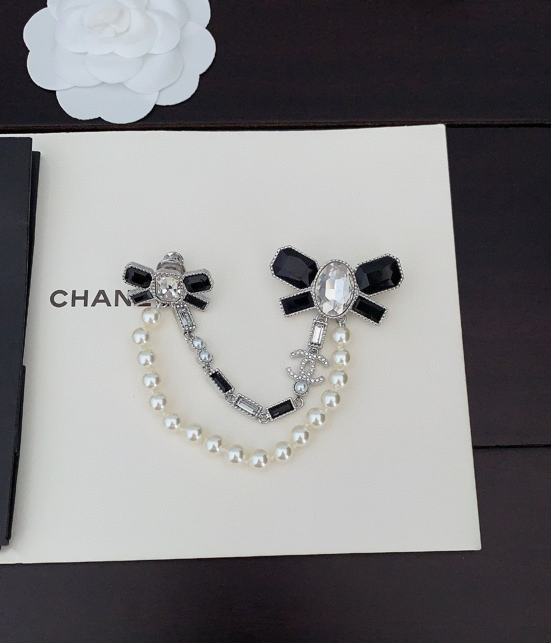 Chanel Black Bow Pearls 18K Gold Brooch product image 5, provided for visual reference and product detail review