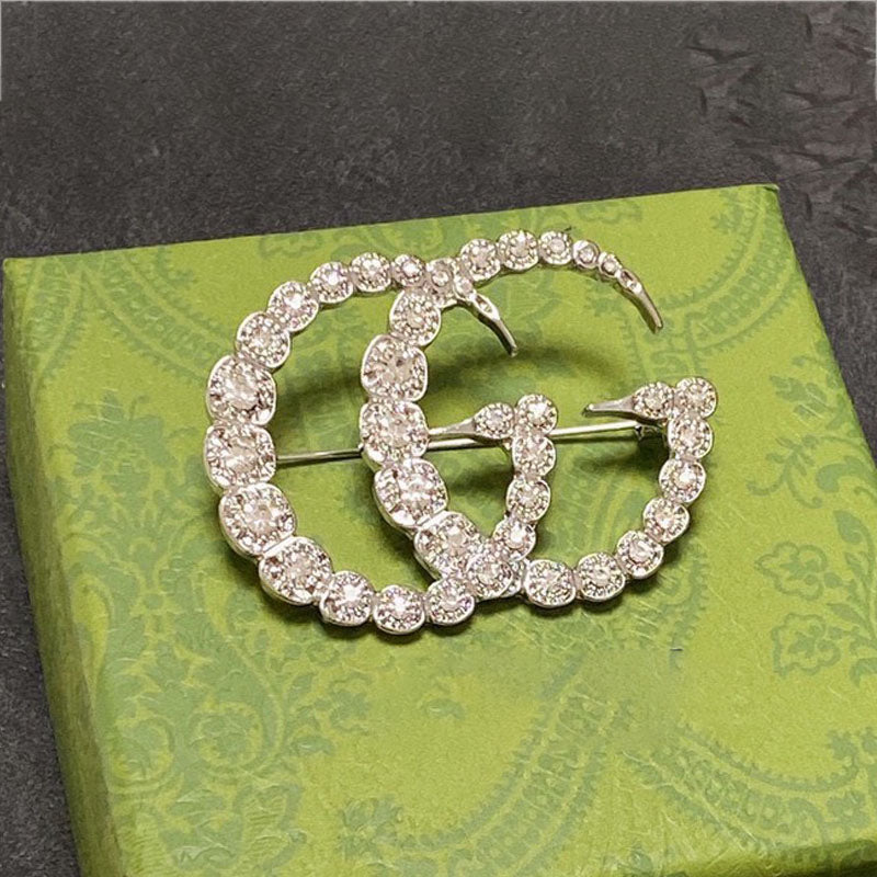 Gucci Double Crystal 18K Gold Brooch product image 1, provided for visual reference and product detail review