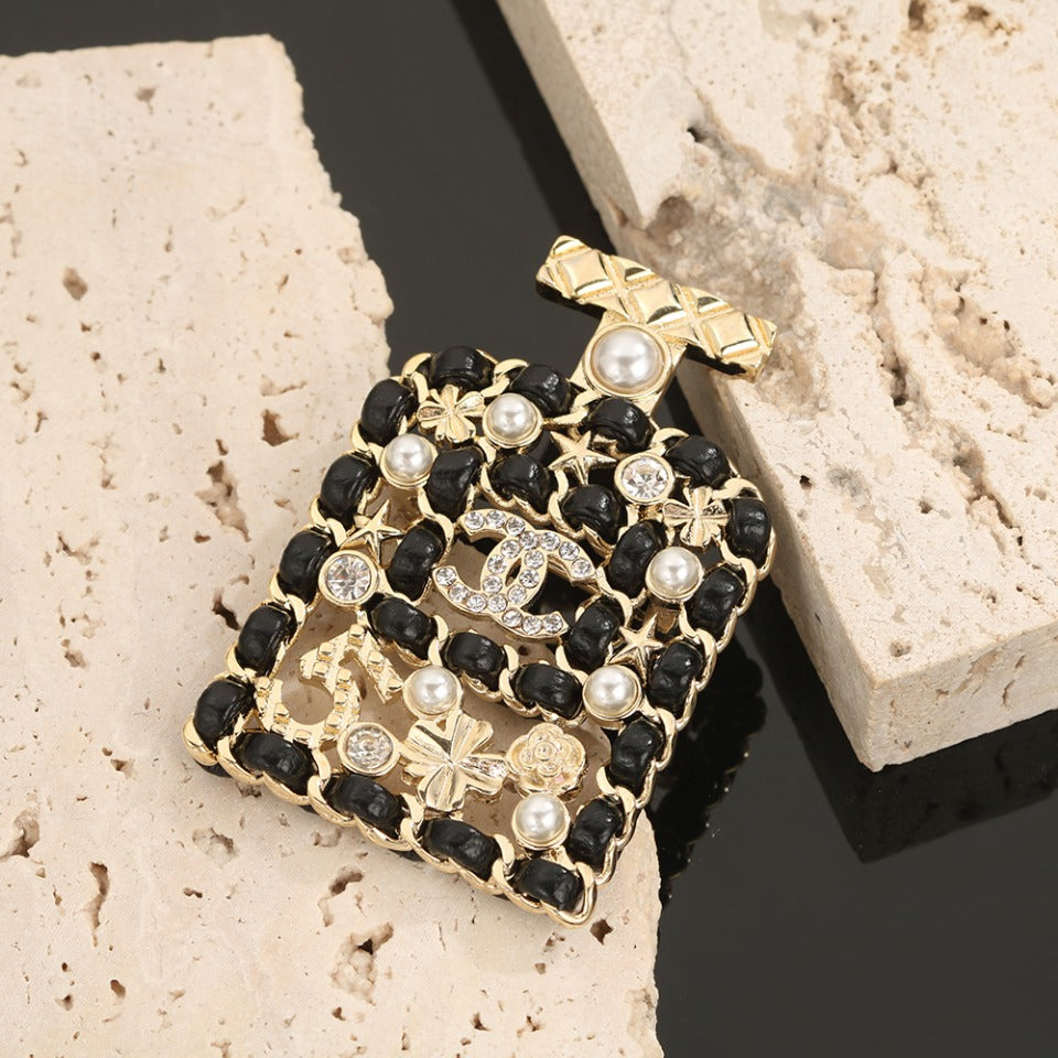 Chanel Bottle Strass 18K Gold Brooch product image 1, provided for visual reference and product detail review