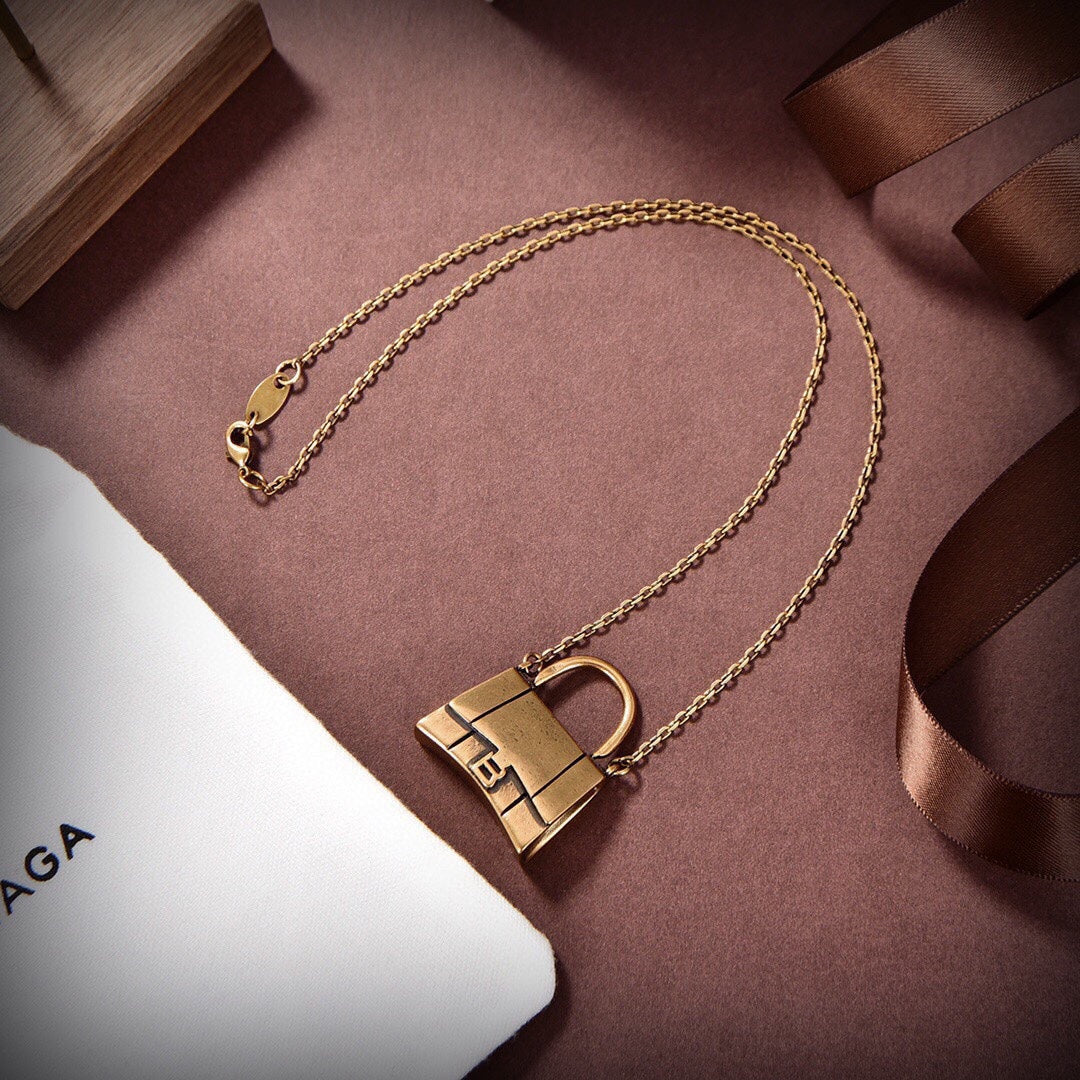 Balenciaga Hourglass Bag 18K Gold Necklace product image 8, provided for visual reference and product detail review
