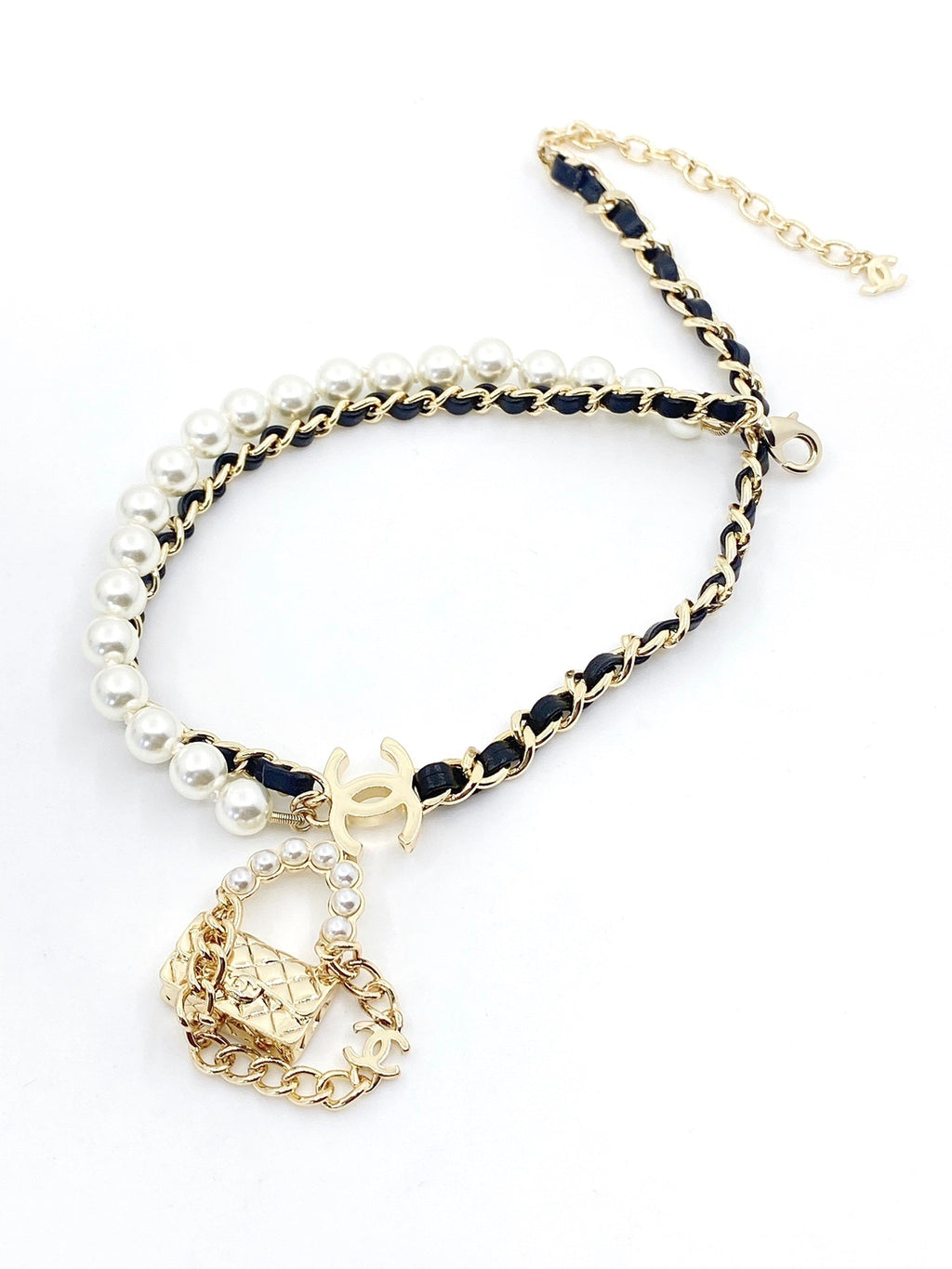 Chanel Pearl Bag Pendant 18K Gold Necklace product image 6, provided for visual reference and product detail review