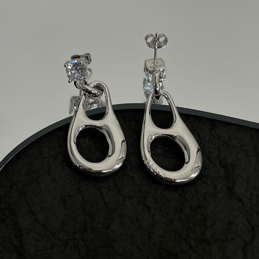 Prada Inverted Triangle 18K Gold Earrings product image 2, provided for visual reference and product detail review