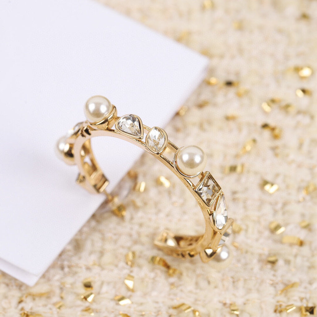 Chanel Pearl Crystal 18K Gold Earrings product image 2, provided for visual reference and product detail review
