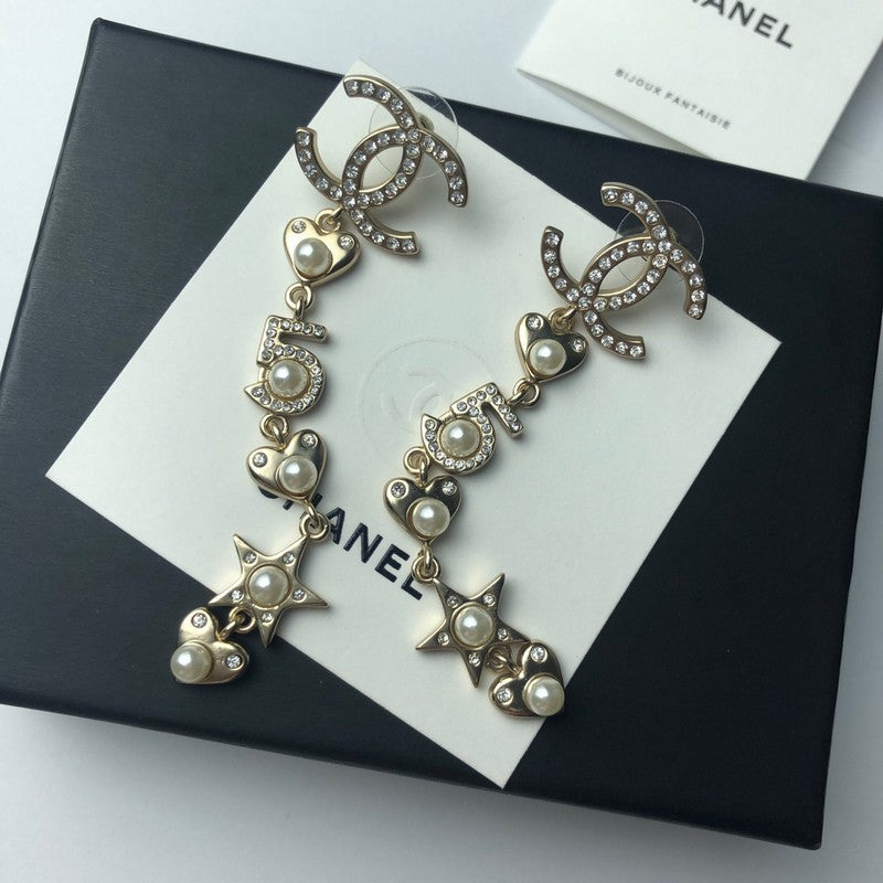Chanel No.5 Long 18K Gold Earrings product image 7, provided for visual reference and product detail review
