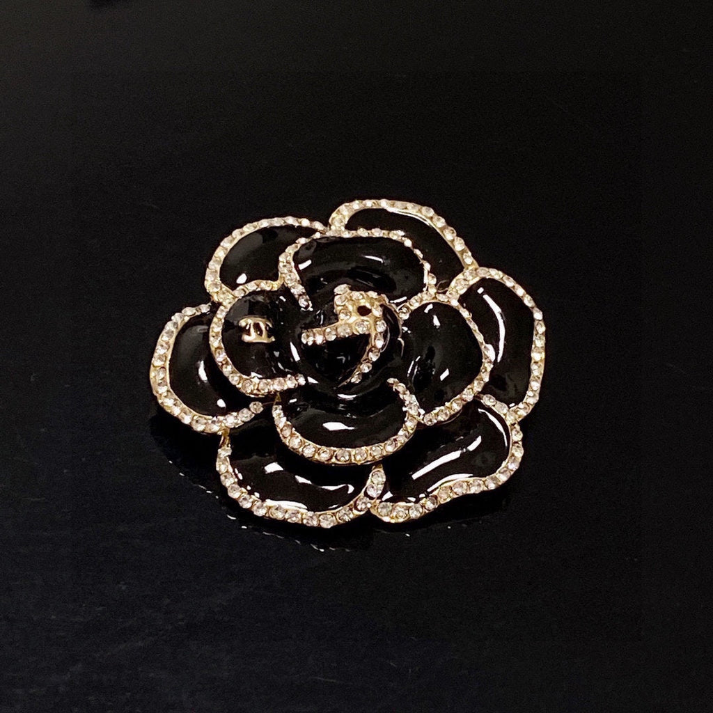 Chanel Black Flower 18K Gold Brooch product image 7, provided for visual reference and product detail review
