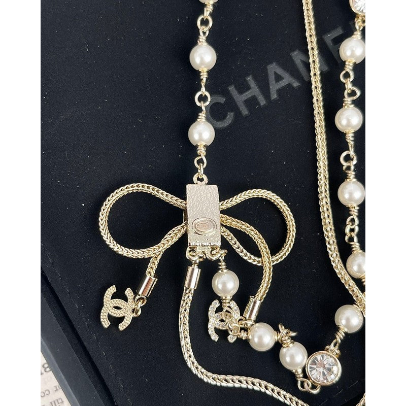 Chanel Bow Tie Pearl 18K Gold Necklace product image 7, provided for visual reference and product detail review