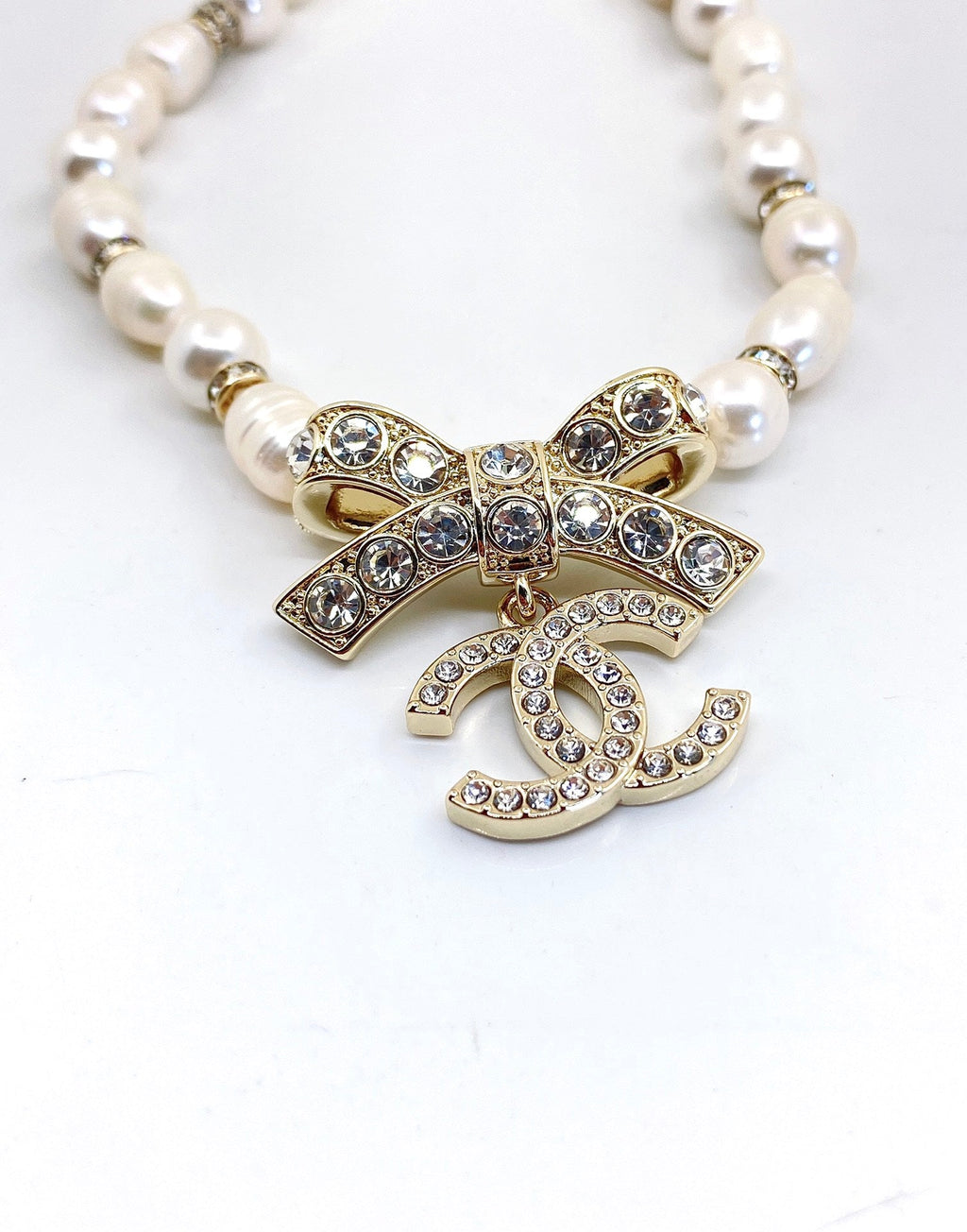 Chanel Bow Tie Diamonds 18K Gold Necklace product image 7, provided for visual reference and product detail review