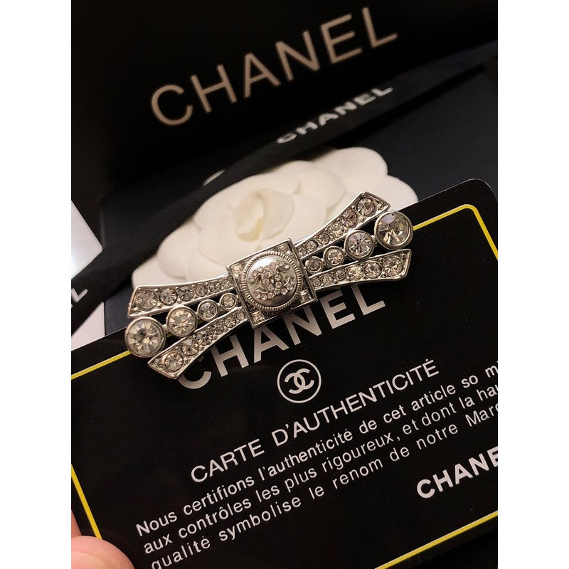 Chanel Bow Tie Diamond 18K Gold Brooch product image 7, provided for visual reference and product detail review
