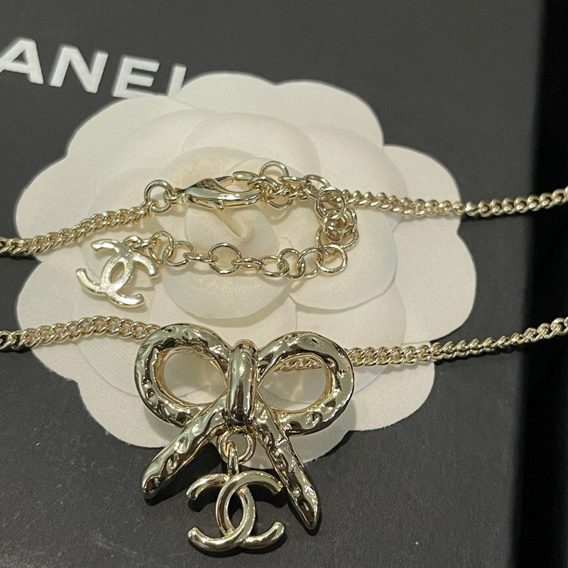 Chanel Gold Bow Tie 18K Gold Necklace product image 7, provided for visual reference and product detail review
