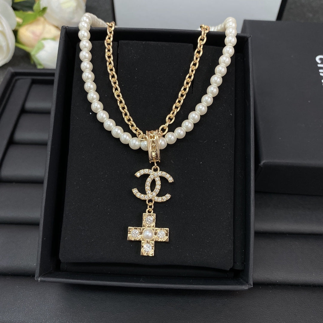 Chanel Cross Diamond Pearl Chain 18K Gold Necklace product image 5, provided for visual reference and product detail review