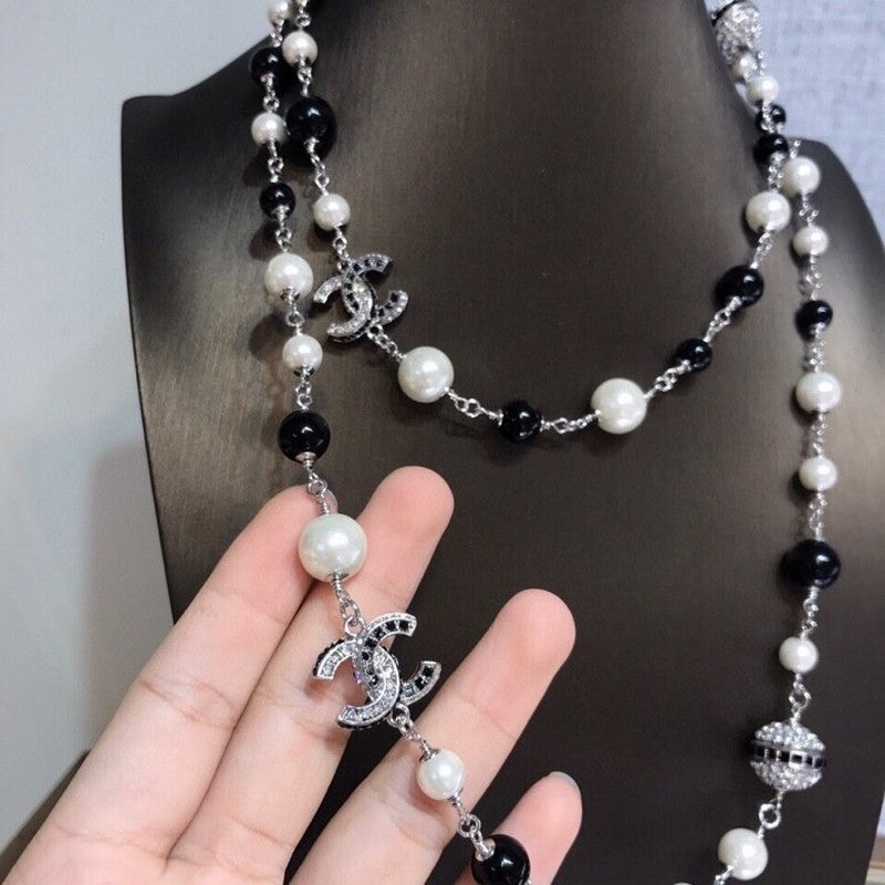 Chanel Long Black Pearl 18K Gold Necklace product image 3, provided for visual reference and product detail review