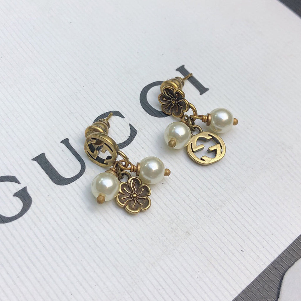 Gucci Double Flower & Pearl Pendant 18K Gold Earrings product image 1, provided for visual reference and product detail