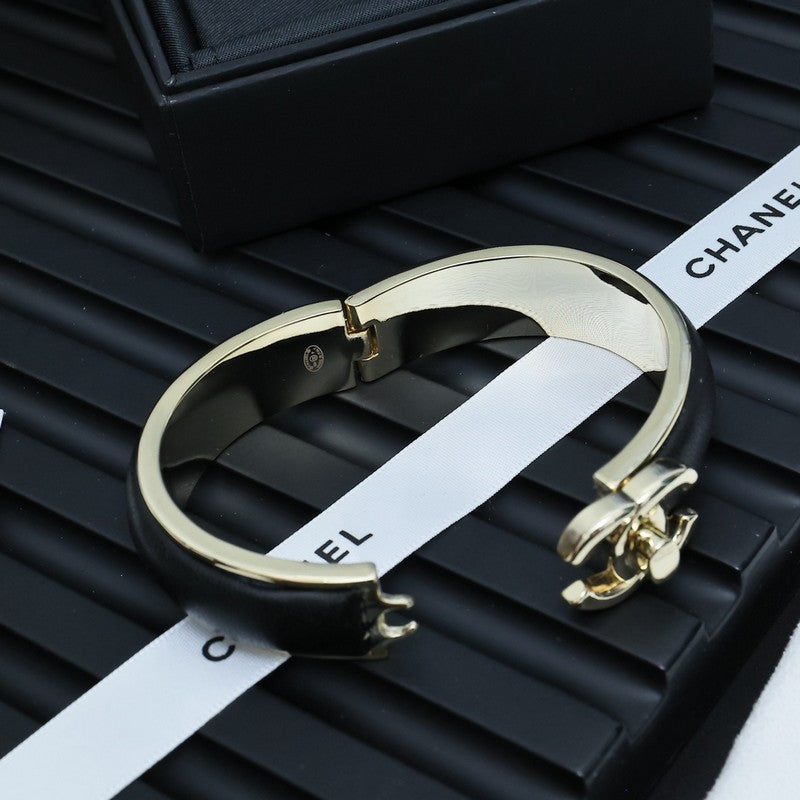 Chanel Black Leather Cuff 18K Gold Bracelet product image 7, provided for visual reference and product detail review