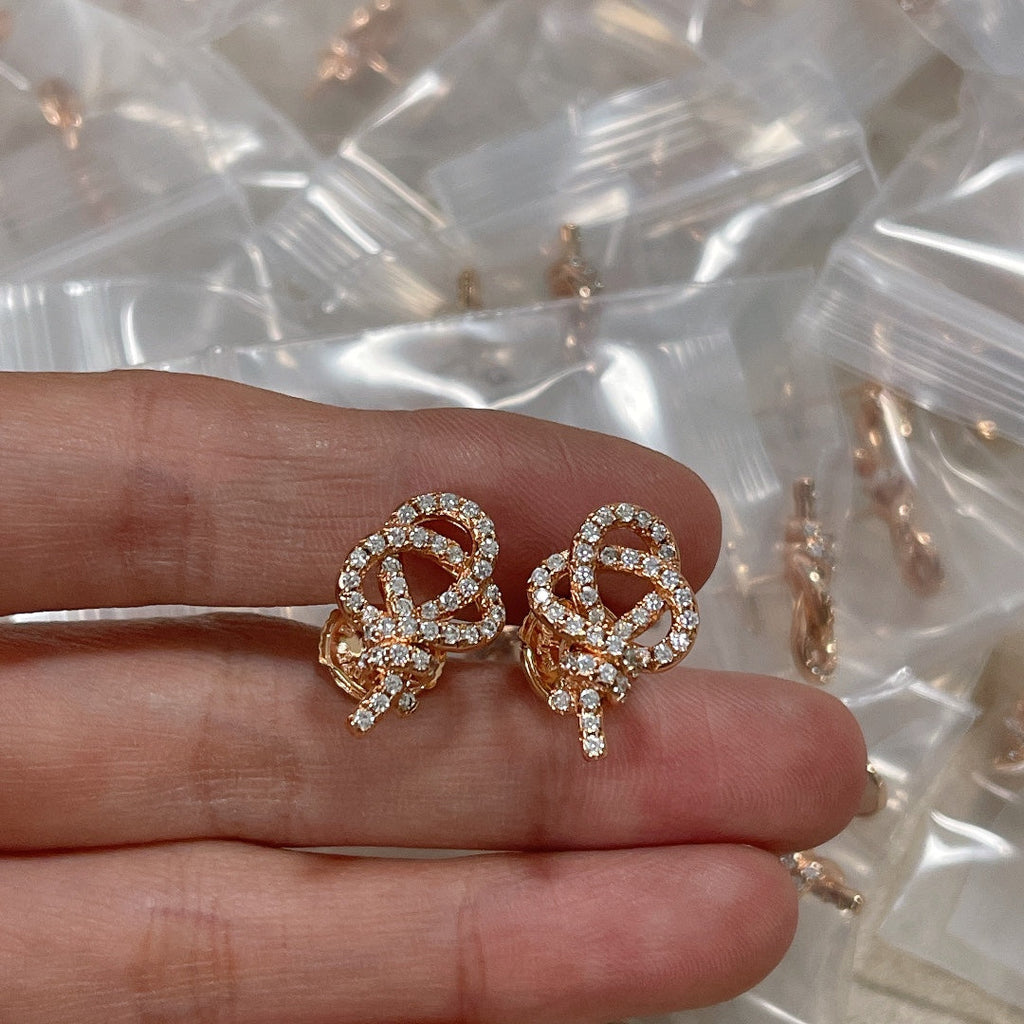 Tiffany Keys Woven Diamond 18K Gold Earrings product image 2, provided for visual reference and product detail review