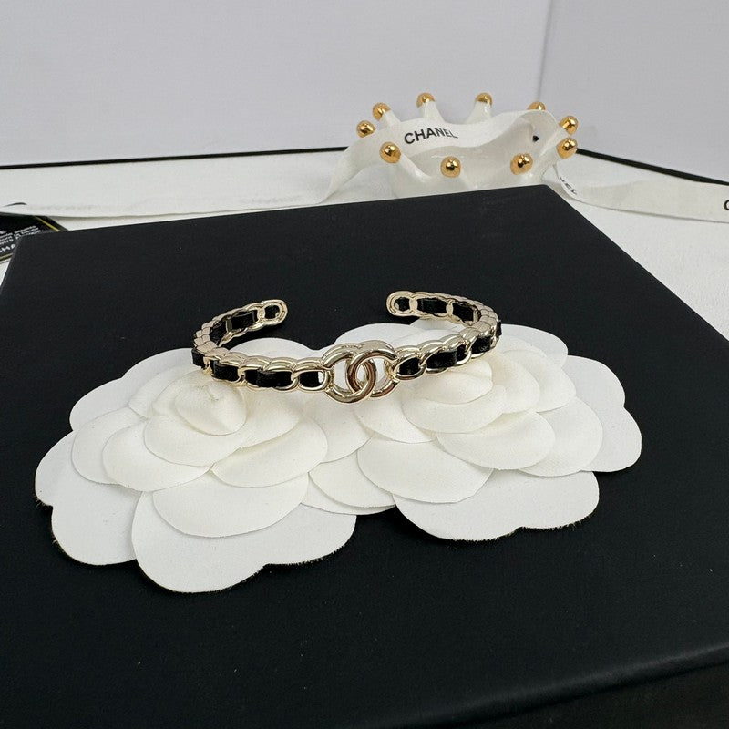 Chanel Black Leather Cuff 18K Gold Bracelet product image 6, provided for visual reference and product detail review