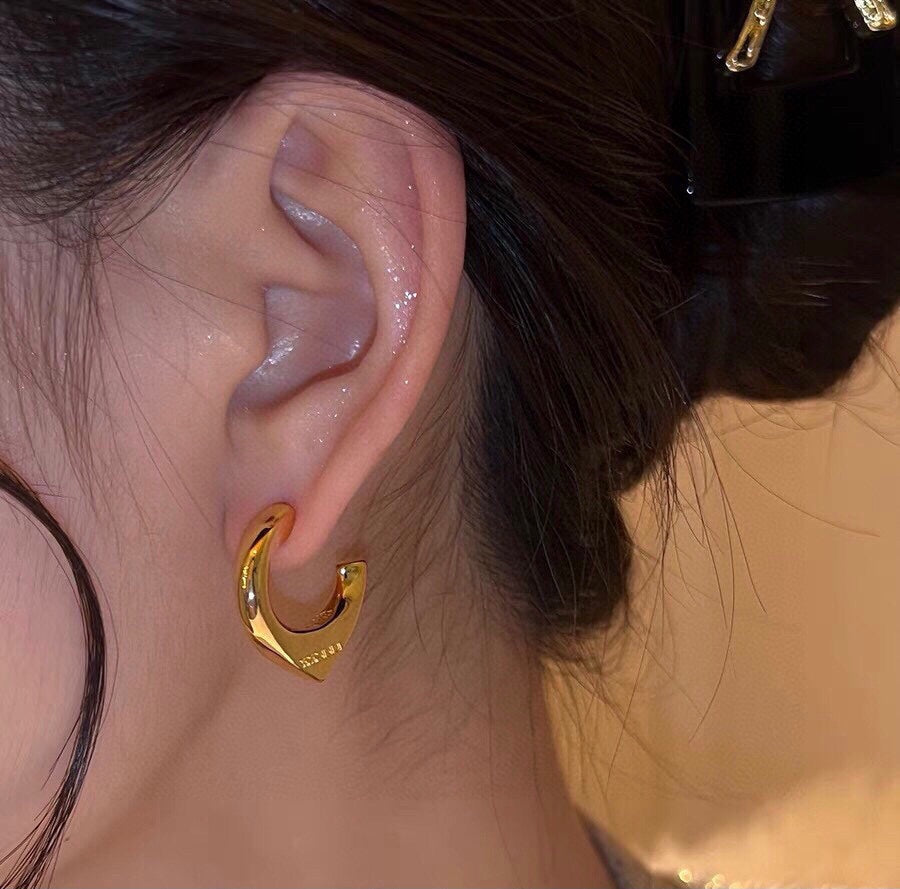 Prada Triangle Open 18K Gold Earrings product image 9, provided for visual reference and product detail review