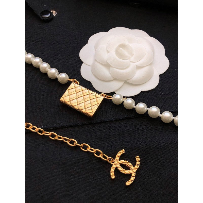 Chanel Pearl Bag Pendant 18K Gold Necklace product image 7, provided for visual reference and product detail review