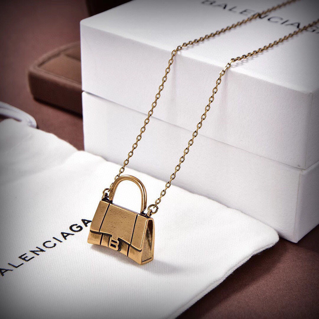 Balenciaga Hourglass Bag 18K Gold Necklace product image 9, provided for visual reference and product detail review