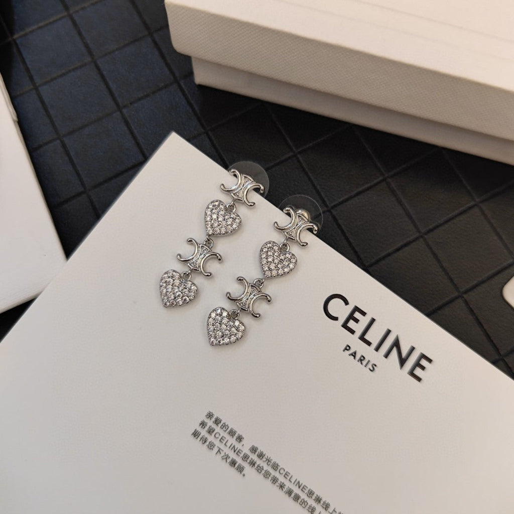 Celine Heart Pendant 18K Gold Earrings product image 7, provided for visual reference and product detail review