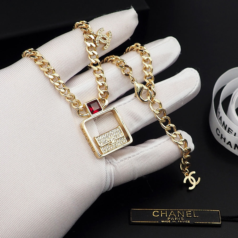 Chanel Red Bag Pendant 18K Gold Necklace product image 7, provided for visual reference and product detail review