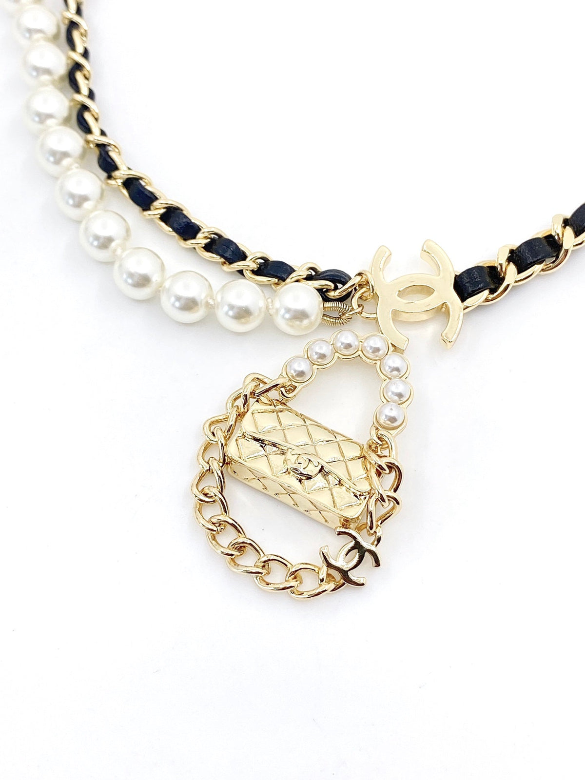 Chanel Pearl Bag Pendant 18K Gold Necklace product image 2, provided for visual reference and product detail review
