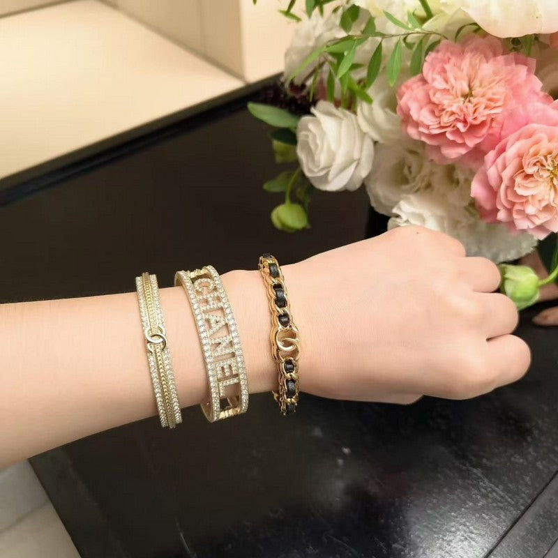 Chanel Black Leather Cuff 18K Gold Bracelet product image 7, provided for visual reference and product detail review