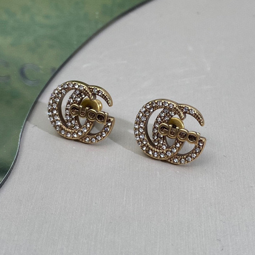 Gucci Double Logo Diamonds 18K Gold Earrings product image 1, provided for visual reference and product detail review