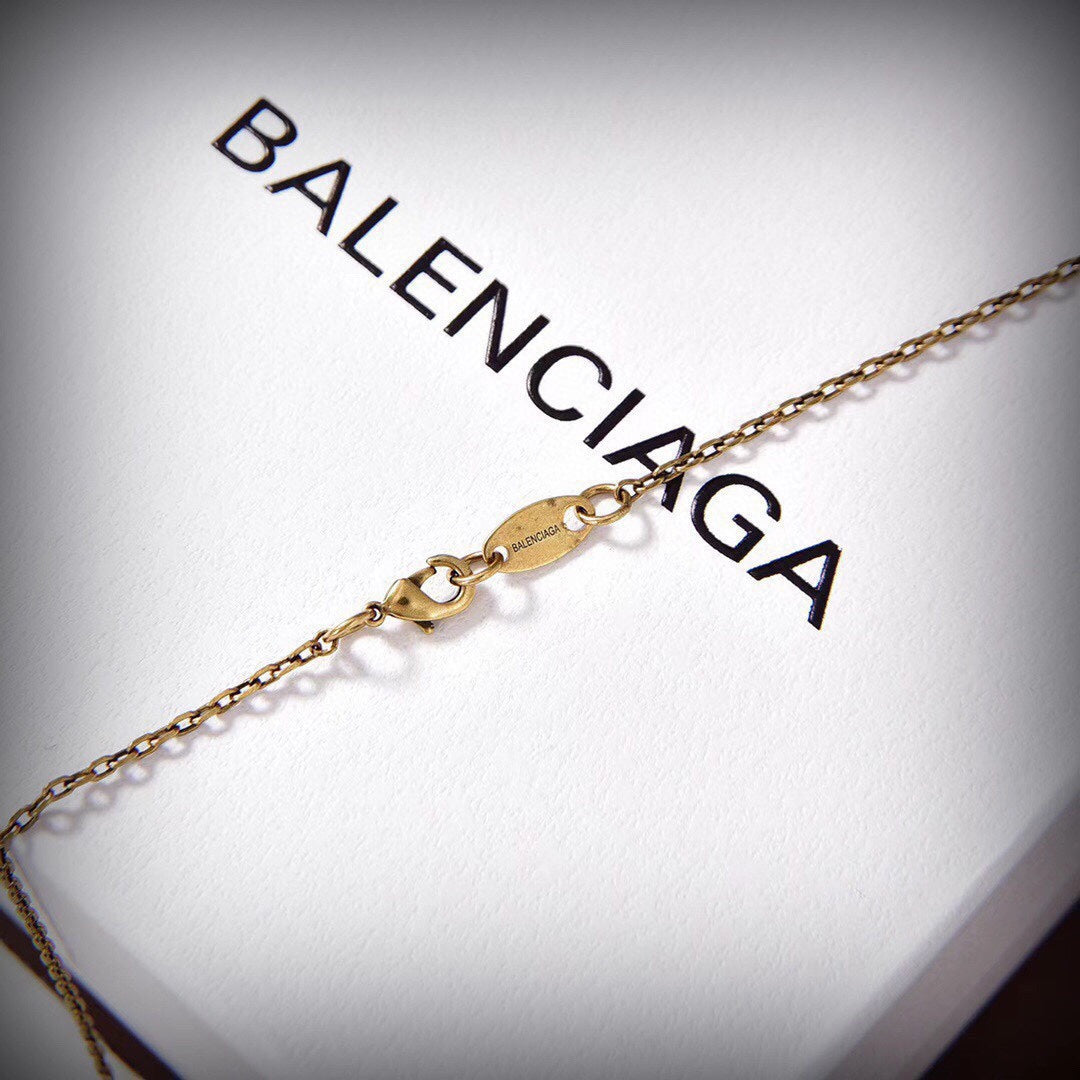 Balenciaga Hourglass Bag 18K Gold Necklace product image 10, provided for visual reference and product detail review