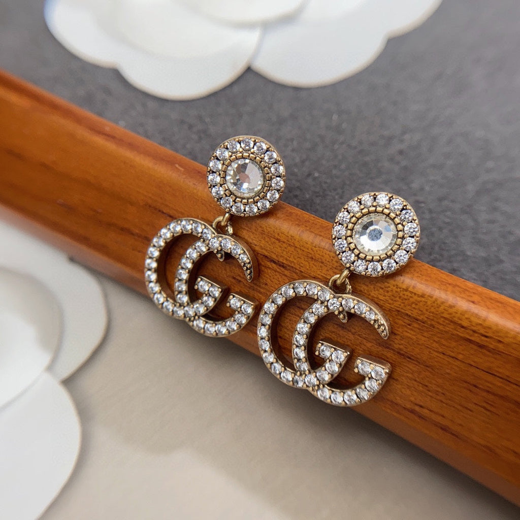 Gucci Double Crystal Pendant 18K Gold Earrings product image 5, provided for visual reference and product detail review