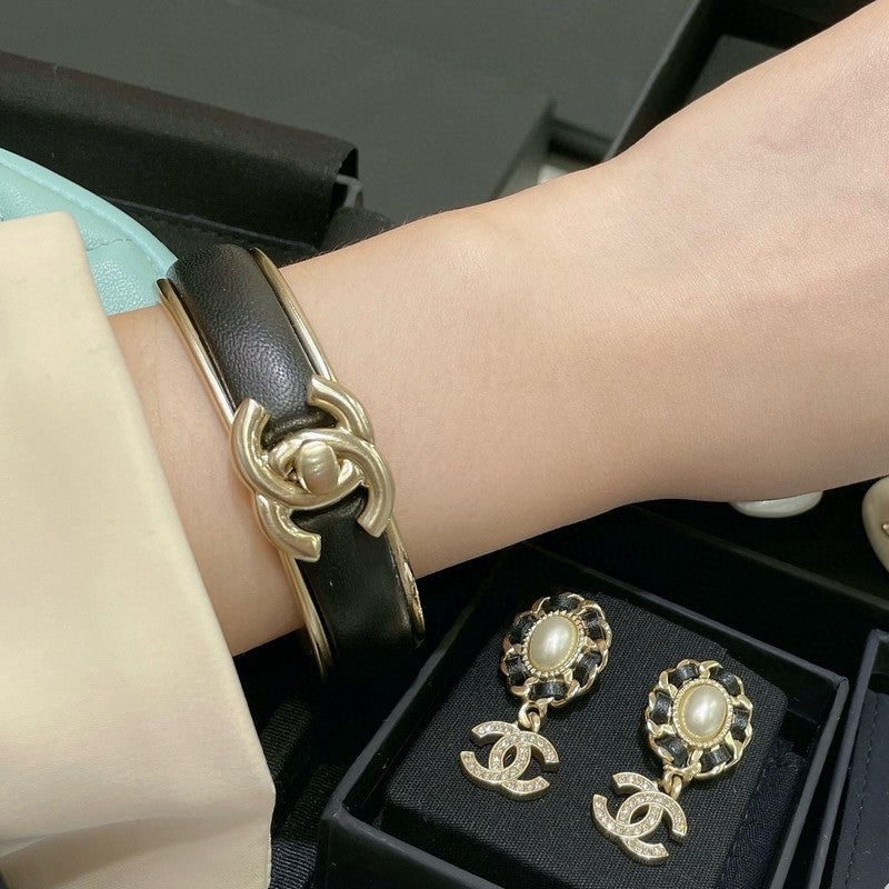 Chanel Black Leather Cuff 18K Gold Bracelet product image 8, provided for visual reference and product detail review