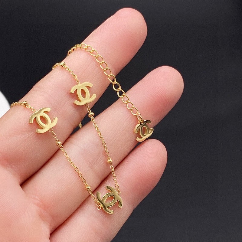 Chanel Small Logo Gold 18K Gold Necklace product image 9, provided for visual reference and product detail review