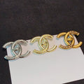 Chanel Paris Gold 18K Gold Brooch product image 1, provided for visual reference and product detail review