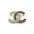 Chanel Black & White Crystals 18K Gold Brooch product image 1, provided for visual reference and product detail review
