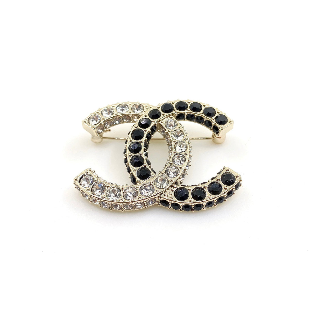 Chanel Black & White Crystals 18K Gold Brooch product image 1, provided for visual reference and product detail review