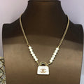 Chanel Pearls Bag Pendant 18K Gold Necklace product image 1, provided for visual reference and product detail review