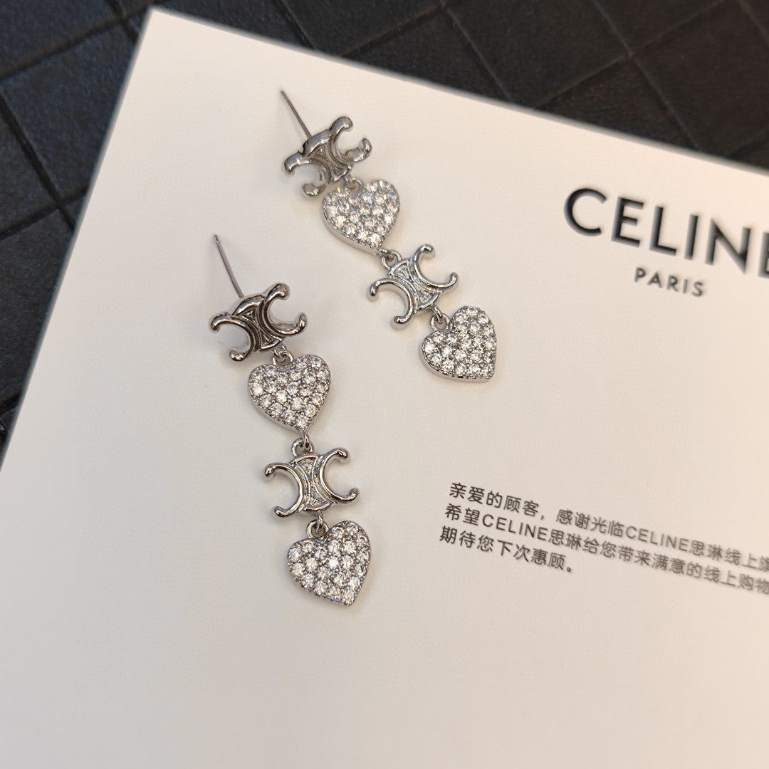 Celine Heart Pendant 18K Gold Earrings product image 8, provided for visual reference and product detail review