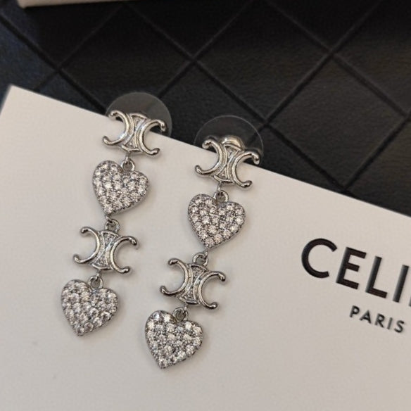 Celine Heart Pendant 18K Gold Earrings product image 4, provided for visual reference and product detail review