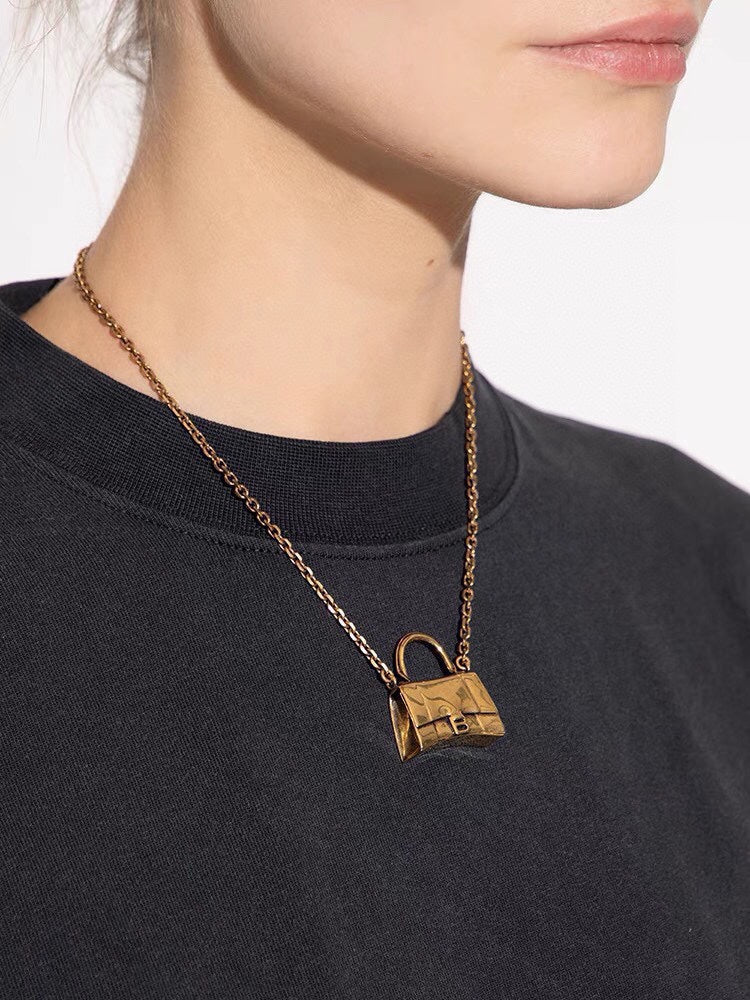 Balenciaga Hourglass Bag 18K Gold Necklace product image 11, provided for visual reference and product detail review
